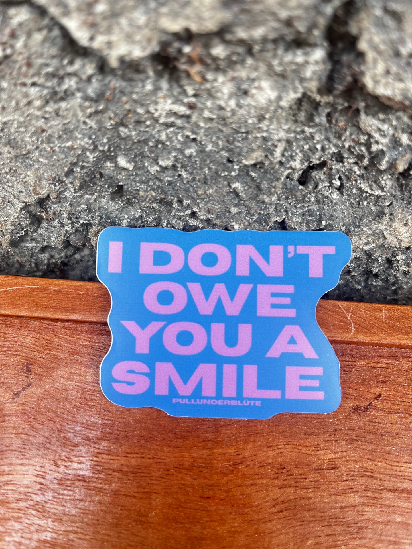I DON'T OWE YOU A SMILE sticker